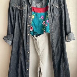 Knee-length denim jacket.